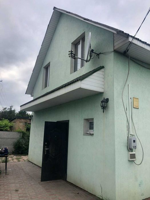 Ділянка 7 сот з будинком у с.Хотів по вул.Шевченка.