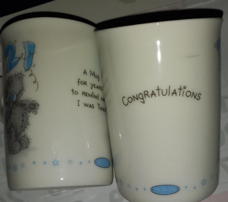 2 ceramic mugs.423596768143626243