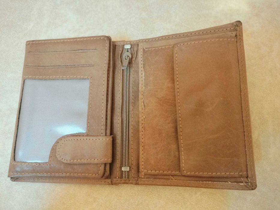 Carteira e Bolsa de pulso para homem em pele novos