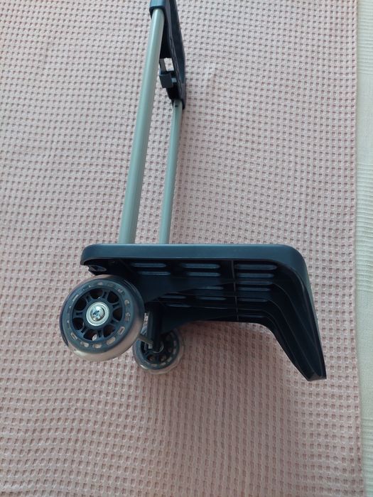 Suporte troley para colocar a mochila