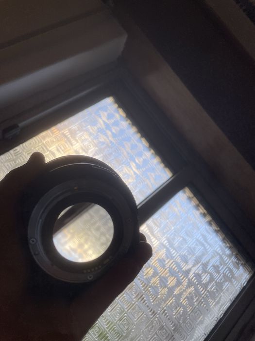 Lente canon EF 50 F1.2 com parasol