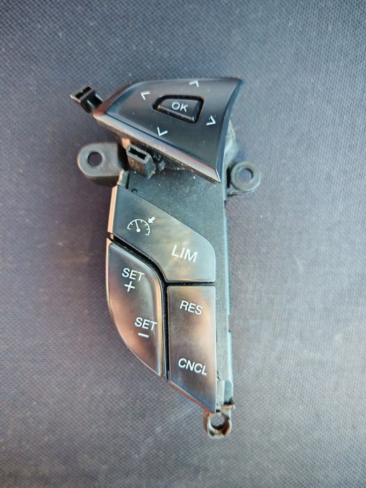 Przycisk tempomatu Ford DG9T-9E740-RBW