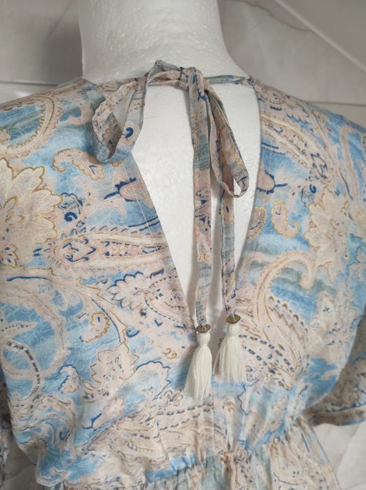 Śliczna sukienka pastelowo niebieska w stylu boho .