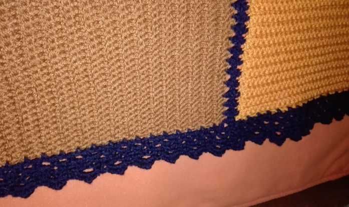 Handmade quilt with a unique pattern.424635160802764801