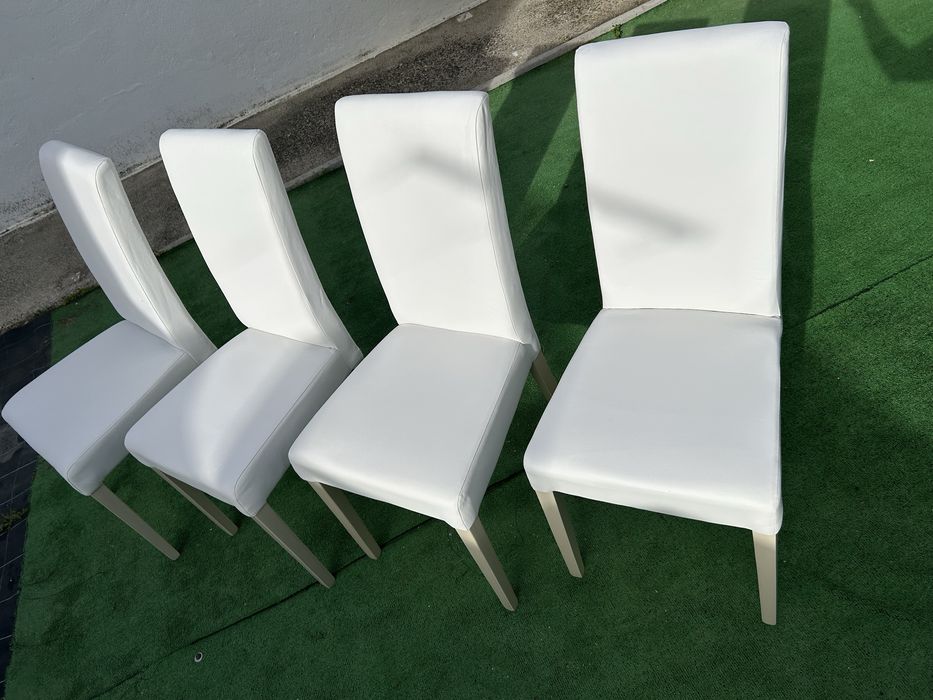 4 cadeiras brancas de sala