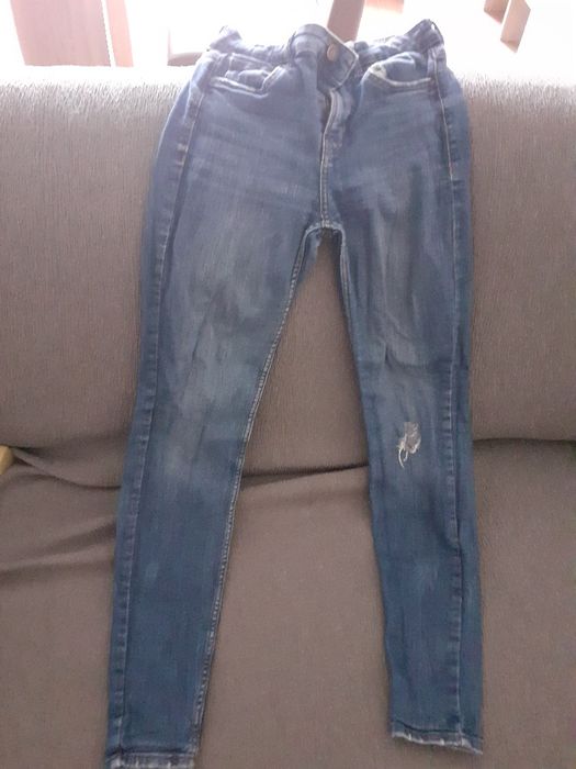 Calças de ganga rasgadas