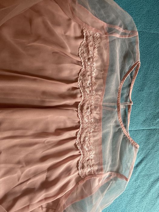 Camisola com mangas fluidas sem uso