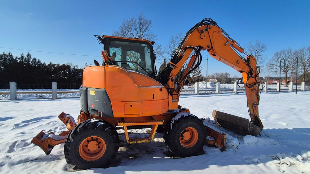 Komatsu PW98-MR8 2014r kompl. 7 łyżek
