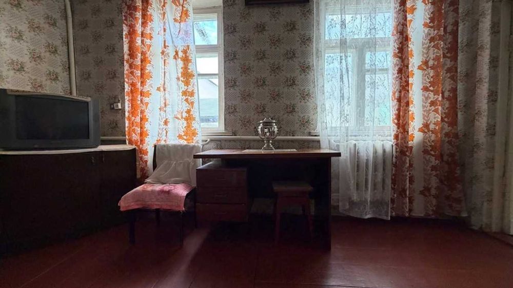 Продаж цегляного будинку 78м². 4 кімнати. 33 сотки. Центр. ID:813