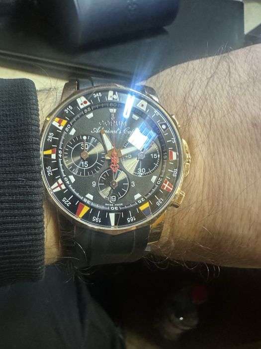 Золотые часы CORUM