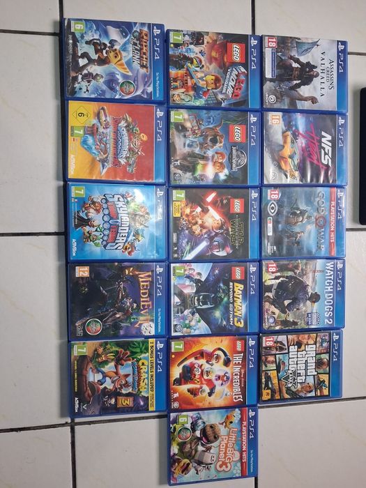 Ps4 slim + 2 comandos + pack de jogos(16)