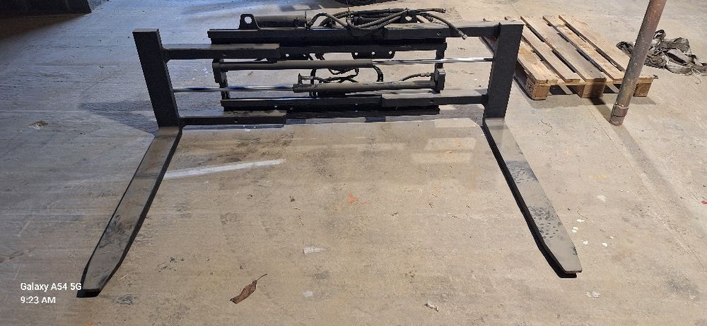 Pozycjonery KAUP chwytak ścisk CASCADE paletyzer wózek widłowy