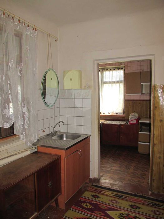 Продам частину будинку по вул. Тітова ( район Дитячої лікарні)
