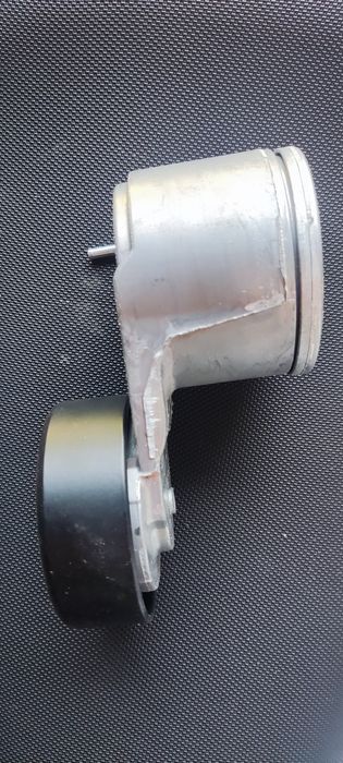 Натяжний ролик 68027611AB ОРИГІНАЛ