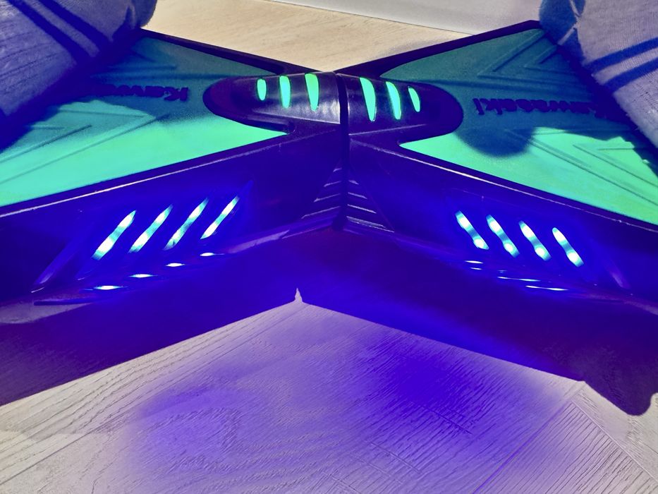 Deskorolka elektryczna Kawasaki z pokrowcem i ładowarką