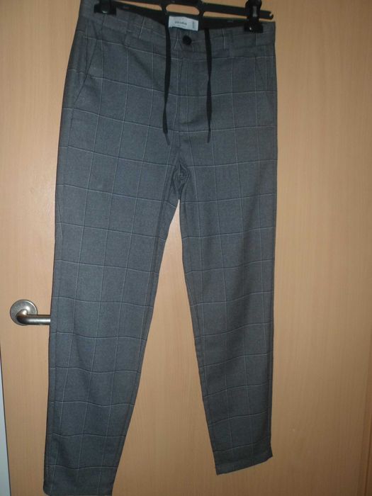calças para homem da marca PULL&BEAR como novas