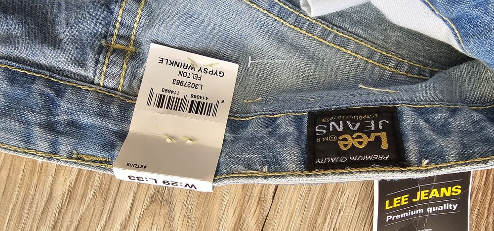 NOWE damskie spodnie dżinsowe Lee W29 L33 szerokie nogawki