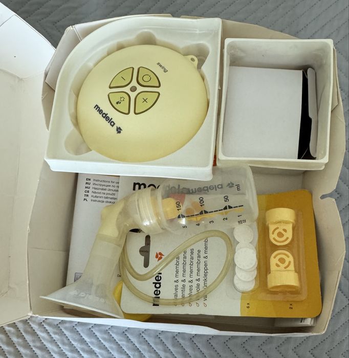 Medela swing електричний молоковідсмоктувач + клапани