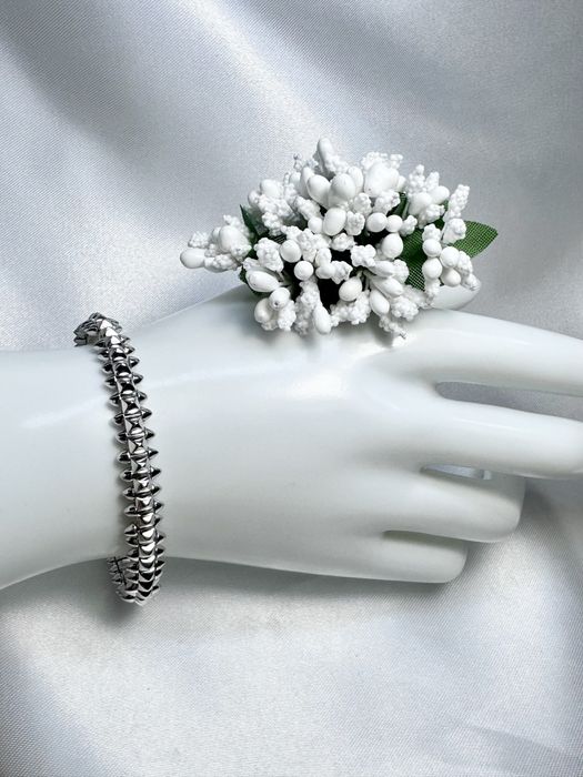 Золотий браслет у стилі Cartier