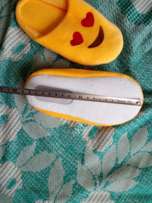 Нові дитячі тапочки