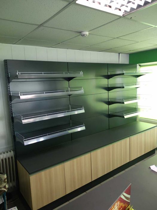 Металеві стелажі для магазинів та прилавки ДСП в наявності