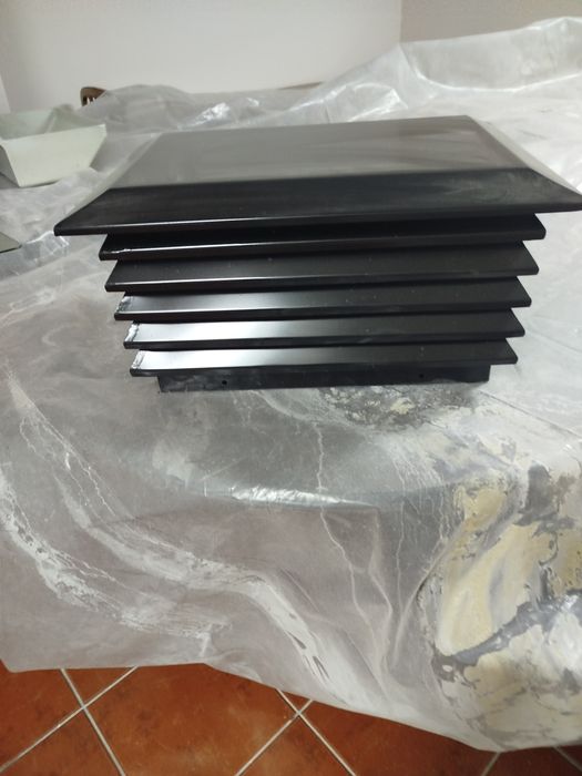 Chapéu em lamelas para chaminé