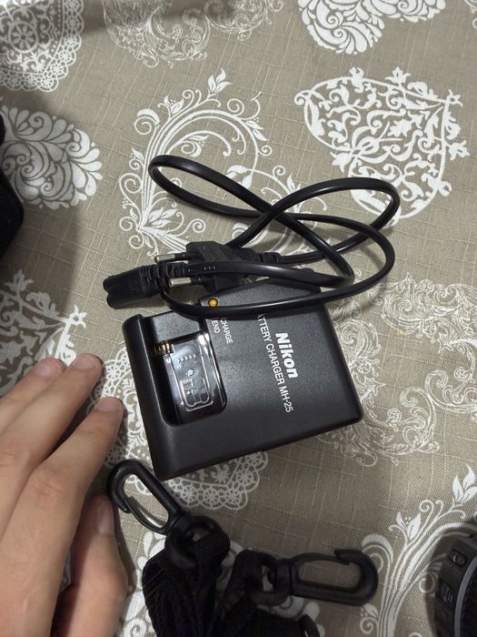 Máquina fotográfica Nikon D7100 + lente