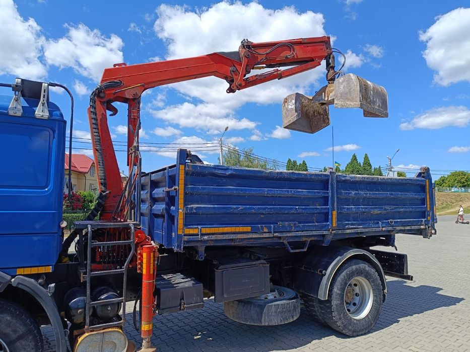 Man самоскид маніпулятор