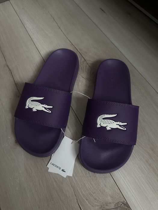 Шльопкі Lacoste нові