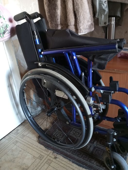 Супровід для жінки на інвалідному візку в поліклініку