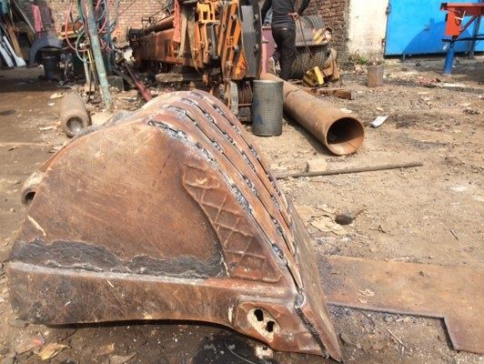 Reparação de baldes de máquinas