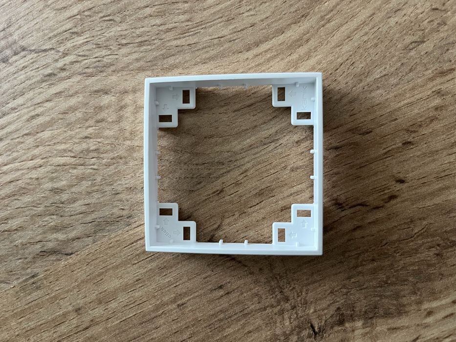 Ramka pośrednia Karlik mini biały mat