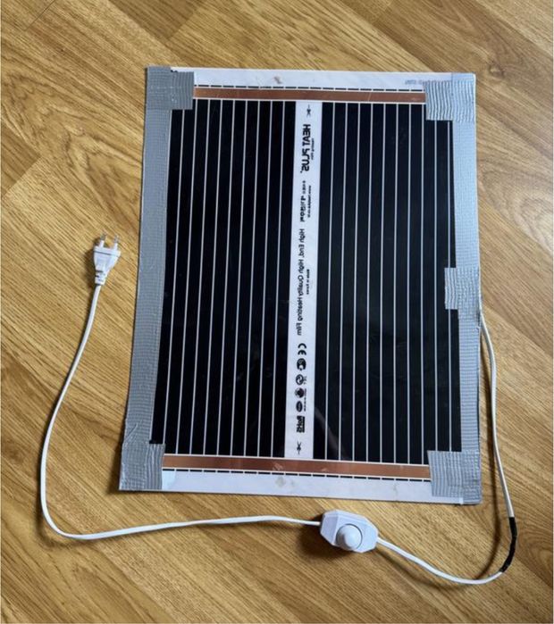 Зігріваючий килимок