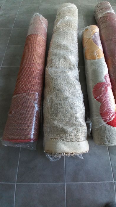 Conjunto 4 tapetes usados.