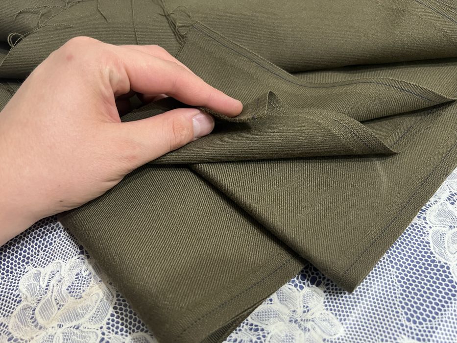 Тканина темно-зелена цупка