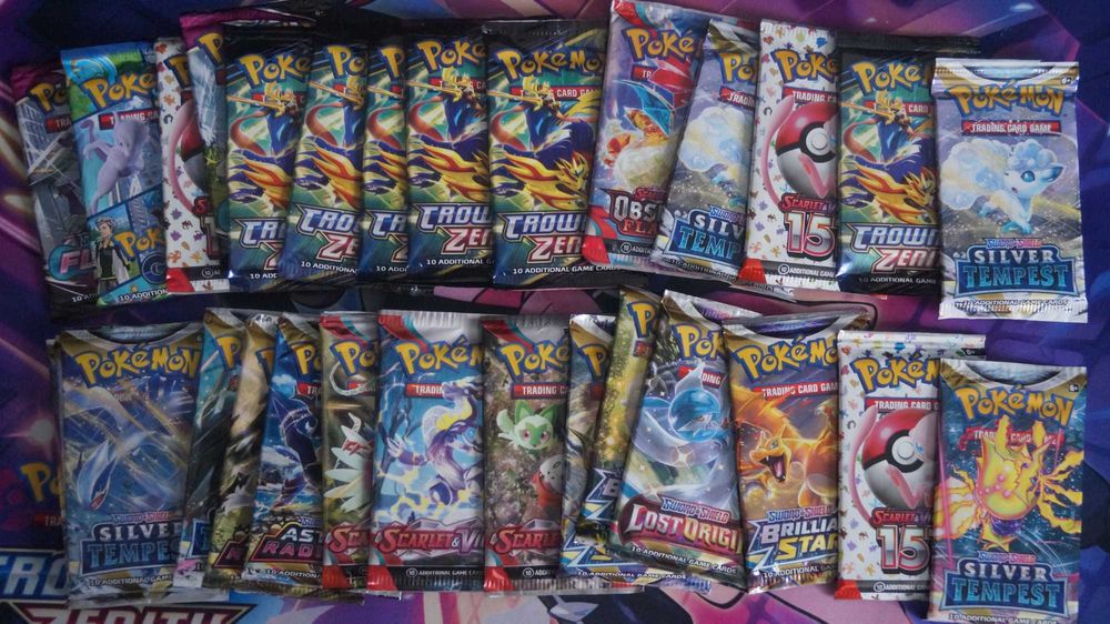 Mini Mystery Box Pokémon TCG – Repack z Boosterem i 100 Kart! vol. 3