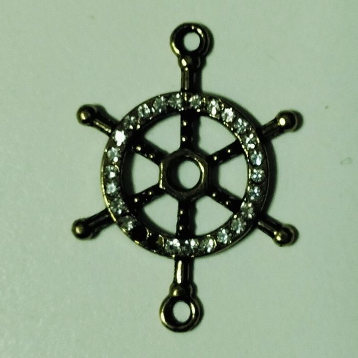 Roda de leme muito antiga  em bronze com pedrasbrilhantes para porta chaves etc etc