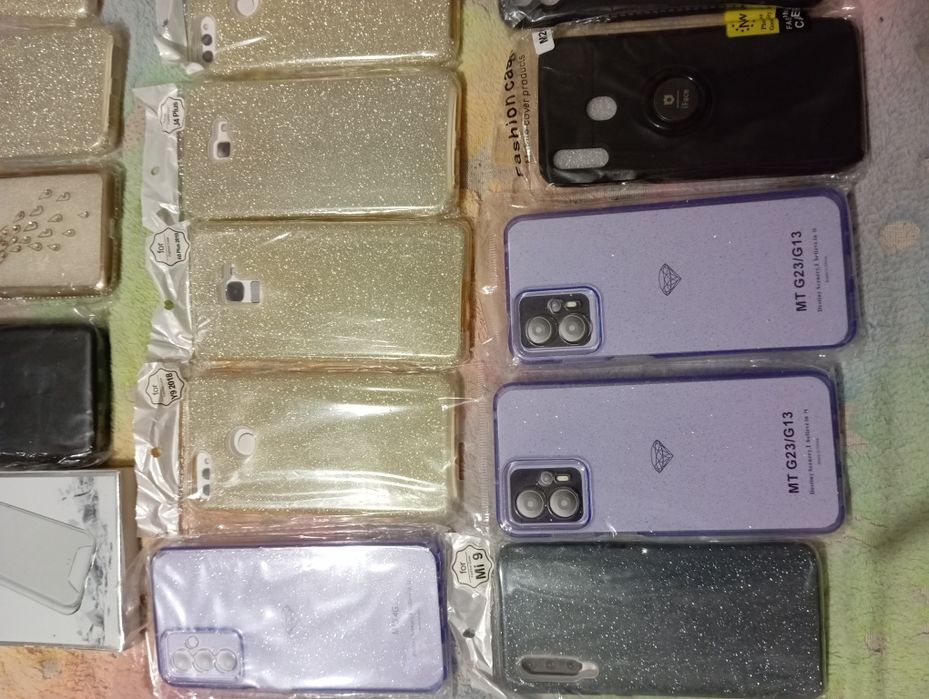 Мега лот чехлов -книжка и бамперов на разные модели телефона.