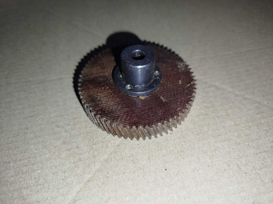 Шестерня 64 мм текстолітова косі зубці