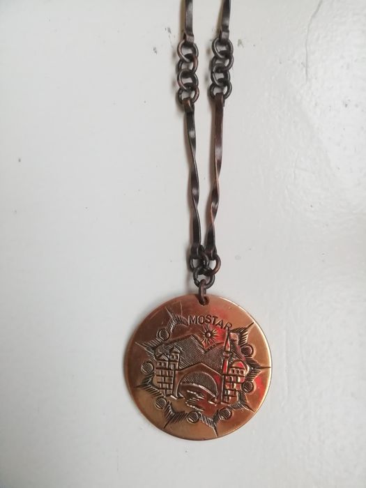 Fio aço com medalha