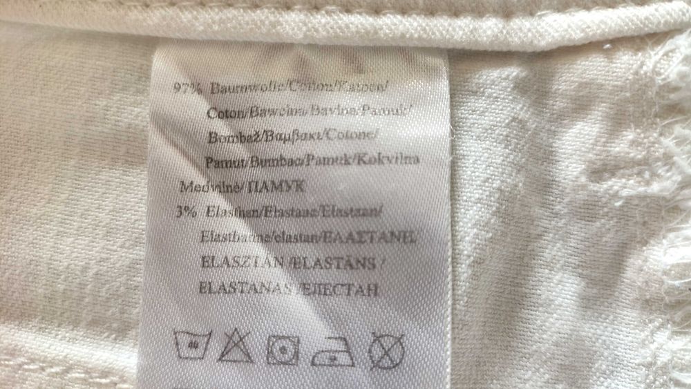 Spodnie damskie dżinsowe białe do połowy łydki
