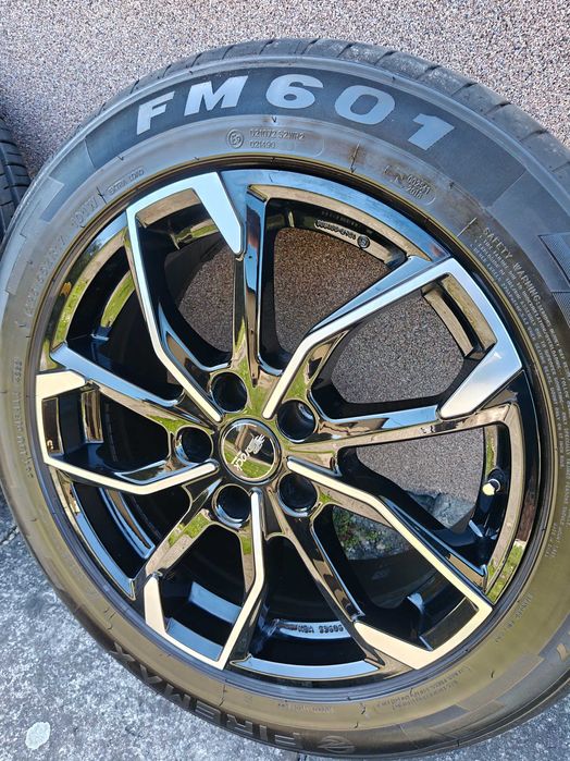 Felgi aluminiowe czarne 17 cali z letnimi oponami