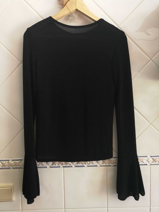Blusa brilhante preta