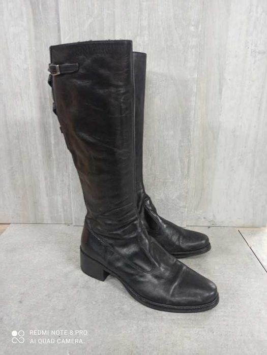 Botas usadas em pele