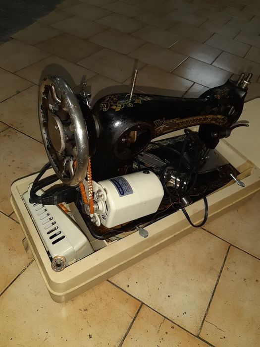 Máquina sde costura singer antiga