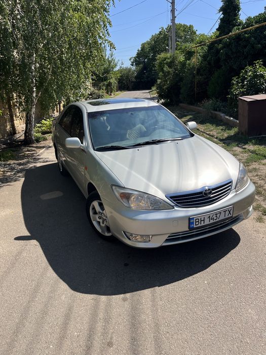 Камри 30, 2.4 газ/бензин на автомате.