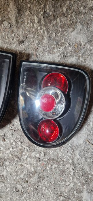 Farolins traz opel corsa b