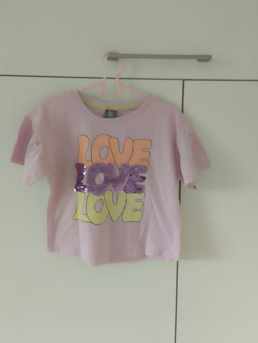 Bawełniany t-shirt dziewczęcy z cekinami 110/116
