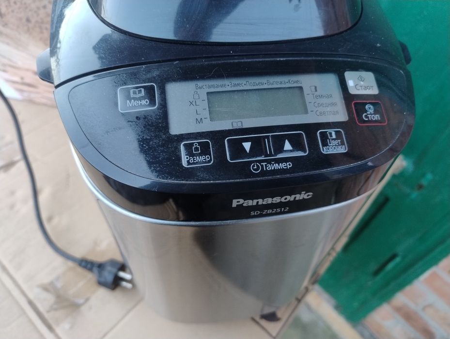 З дефектом робоча автоматична хлібопіч Panasonic SD-ZB2512 хлібопічка