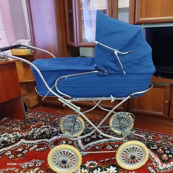 Продам коляску, стан, нова